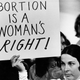 A young woman holds a sign demanding a woman’s right to abortion at a demonstration to protest the closing of a Madison abortion clinic in Madison, Wis., April 20, 1971. Photo via AP